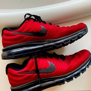 Maroon Nike running shoes